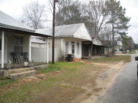 The Pinkard stores and home in March 2011, photo by Kaufman