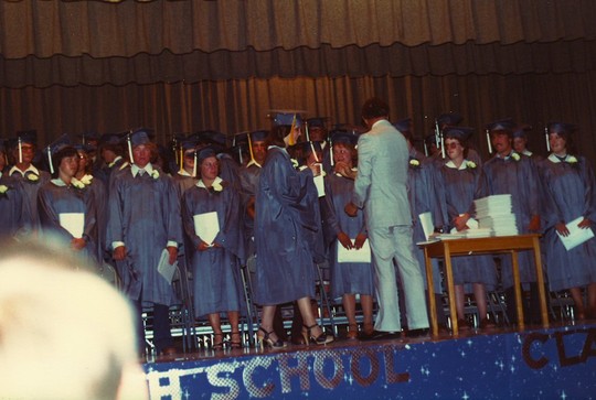 Debbie Ellenson receiving her diploma.