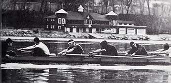 Morning practice on the Potomac with the Boat Club in background.