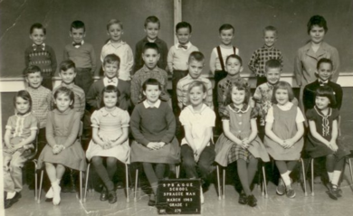 A group of children in a classroomDescription automatically generated