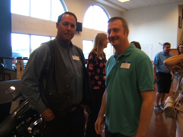 Terry Schnackenberg and wife Julie and Mark Sanders