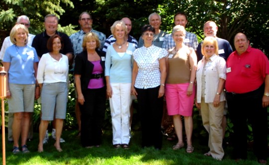 Jean, Mary, Jill, Margrethe, Linda, Marilyn, Karen, Greg, (back row) Jon, Jim D, Gary, Dan, Jim E, Don, Theron