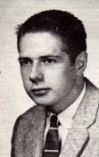 A person wearing a suit and tieDescription automatically generated with medium confidence